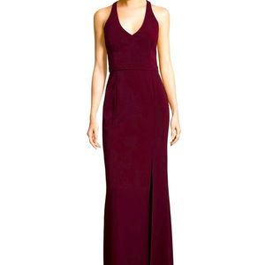 Ankle length evening gown. Halter style. Strappy back. Lined. Built in cups.